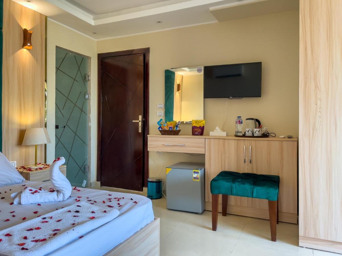 Jumeirah Pyramids View Inn Kafrat al Jabal Exterior photo
